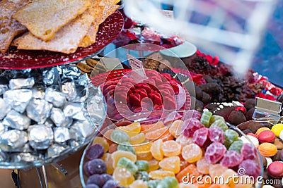 Close up view at fruit jellies and macaroons Stock Photo