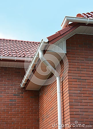 Close up view on House Problem Areas for Rain Gutter Waterproofing Outdoor. Home Guttering, Gutters, Plastic Guttering System, Stock Photo