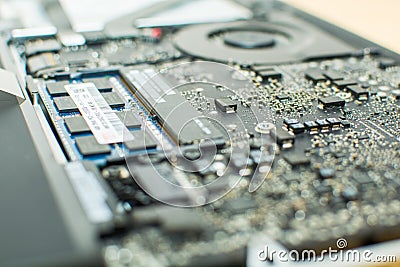 Close-up view of internal components of a mid-2012 MacBook Pro with back cover removed. Editorial Stock Photo