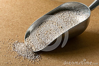 A Scoop of Lawn Weed and Feed Stock Photo