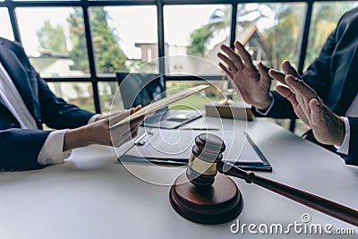 Close-up view of lawyer refusing to accept bribe from client make a broken deal Judge Stock Photo