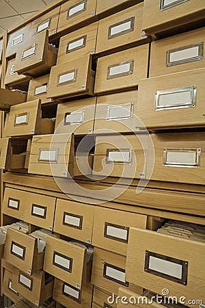 Close up view on library wooden card catalog with opened crates Stock Photo