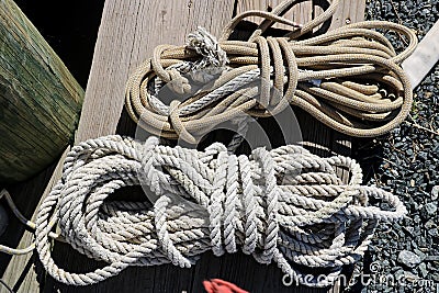 Close-up view of nautical ropes on a dock on a piet Stock Photo