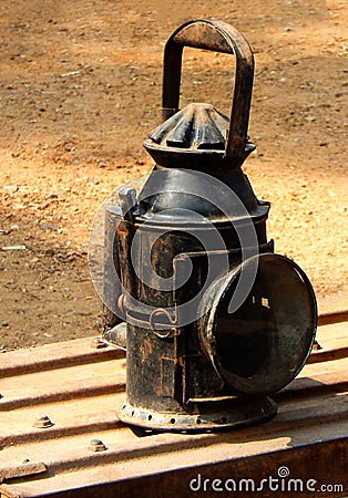 View of old and antique oil lamp used in rail transport for sgnalling in the night Editorial Stock Photo