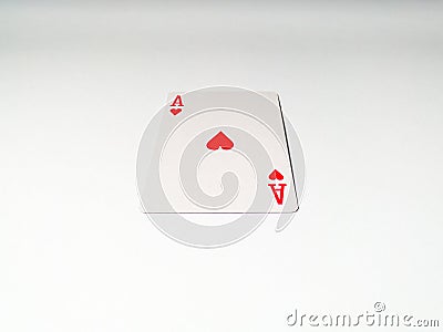 A close up view at one ace card with a heart suit from a deck of playing cards. The concept of games, gambling, fun and free time Stock Photo