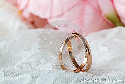 Close up view of pair golden wedding rings Stock Photo