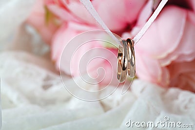 Close up view of pair golden wedding rings Stock Photo