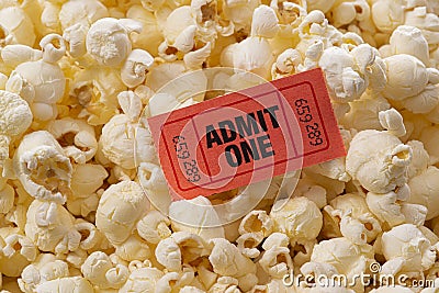 Close-up View of Popcorn and Movie Ticket Stock Photo