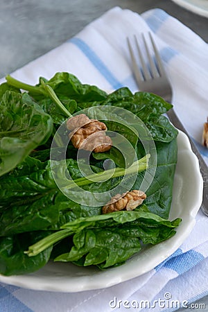 Close up view of raw spinach salad, vegetarian ingredient Stock Photo
