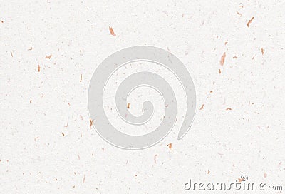 Close up view of recycled paper background with inclusions of golden particles. Stock Photo