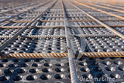 Close up view of reinforcement of concrete. Geometric alignment of Rebars on construction site. Reinforcements steel Stock Photo