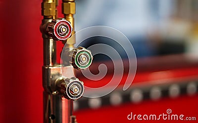 view of rotating knob for controlling operations of process in pipelines in an Industry Stock Photo