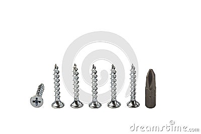 Close up view of screws and cross magnetic bit isolated. Industrial equipment concept Stock Photo