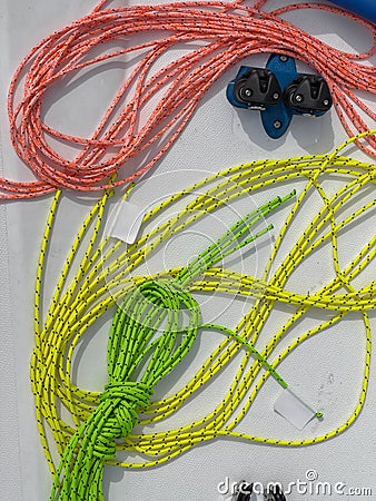Close-up view of set of ship equipment, ropes for management of the sailboat of different color, yachting sport, the Stock Photo