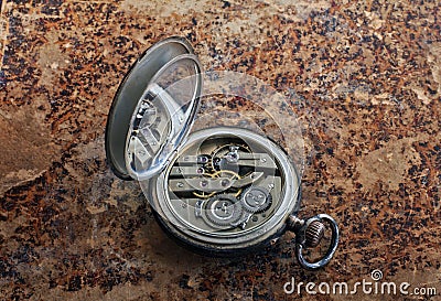 Close-up view of a silver pocket watch. Stock Photo