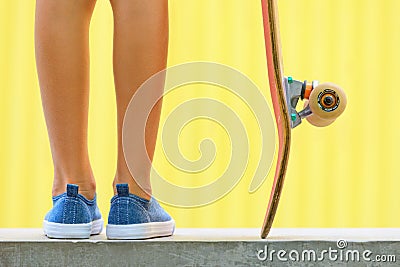 Close up view of skateboarder legs, sneakers, skateboard Stock Photo