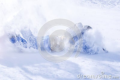 Close up view snowboarder fall on snow while snowboarding Stock Photo