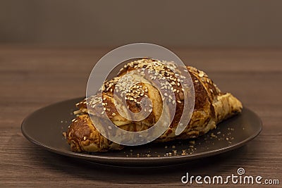 Croissant sprinkled with sesame Stock Photo