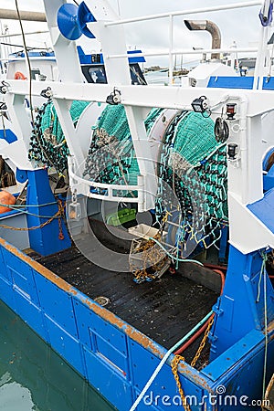 Close up view of trawling nets on the back of an offshore fishing boat Editorial Stock Photo