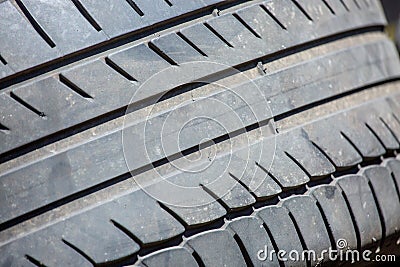 Close-up of the tread of a used tire Stock Photo
