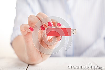 Close up view of usb flash pendrive in female hand Stock Photo