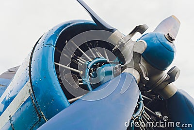 Close up view of a vintage propeller passenger and cargo airplane. Stock Photo