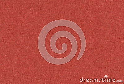 Close up view of warm red paper carton background with inclusions of recycled paper particles. Stock Photo