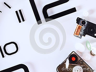 Watch face with partial numbers and a damaged machine Stock Photo