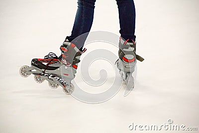 Close up view, on white, of inline skate or rollerblade on the ice rink Stock Photo