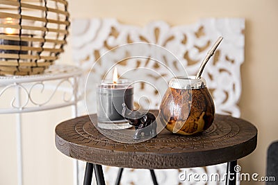 Close up view of yerba mate tea calabash with metal bombilla straw. Stock Photo