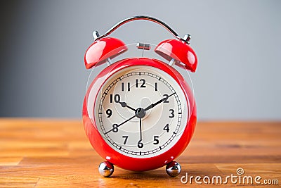 Close up of a vintage red bell clock Stock Photo