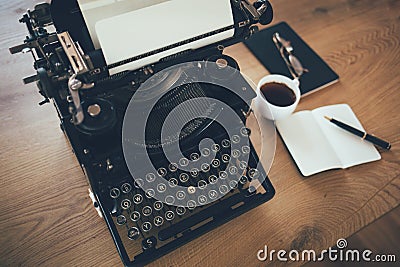 Close up of vintage writers desk with typewriter Stock Photo