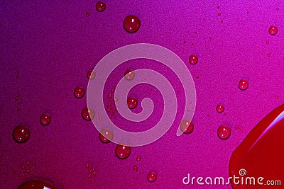 Close up of water drops on dark red tone background. Abstract red wet texture with bubbles on plastic PVC surface or grunge. Stock Photo