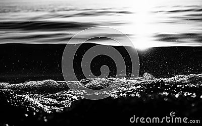 Close up water splash in lake wave. Black and white artwork Stock Photo