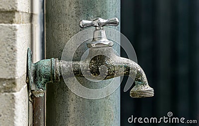 A close up of a weathered garden faucet water tap Stock Photo