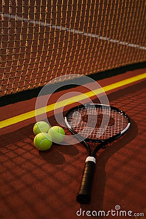 Well-string tension racket on tennis court Stock Photo