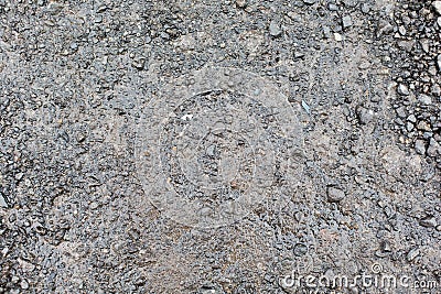 Close up of wet gray gravel road or ground Stock Photo