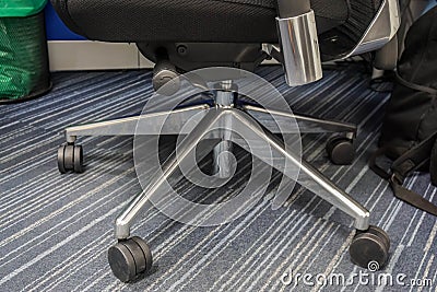 Close up wheels of swivel office chair for business people seat Stock Photo