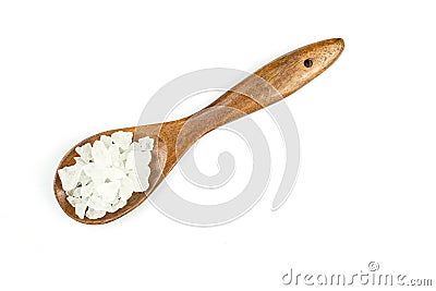 Close up white rock sugar in wooden spoon isolated on white Stock Photo