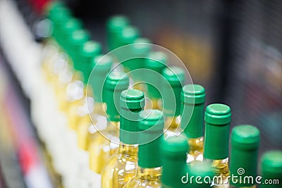 Close up of white wine bottles Stock Photo