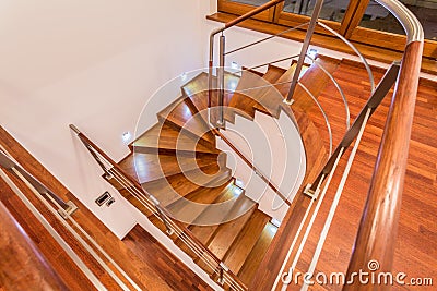 Close-up of winding wooden stairs Stock Photo