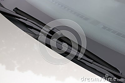 Close Up Of Windscreen Wipers In Resting Position on Windshield Stock Photo