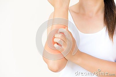 Close up woman arm scratch the itch by hand at home. Stock Photo