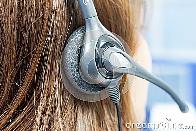 Close up woman callcenter on the job with headset Stock Photo