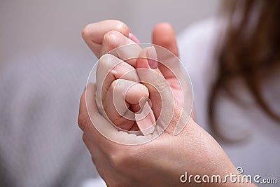 Woman Cracking Their Knuckles Stock Photo