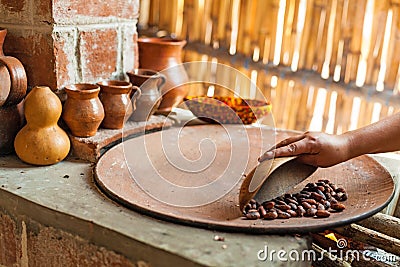 Guatemala. Chocolate Making. Roasting Raw Cocoa Beans Stock Photo