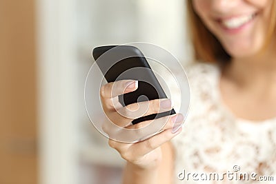 Close up of a woman hand using a smart phone at home Stock Photo