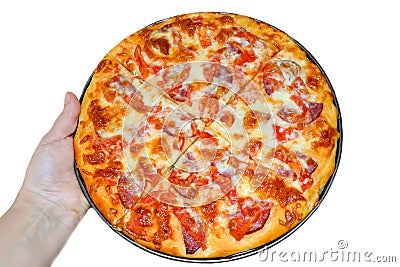 woman holds in her hand a round, appetizing beautiful baked pizza on a white background Stock Photo