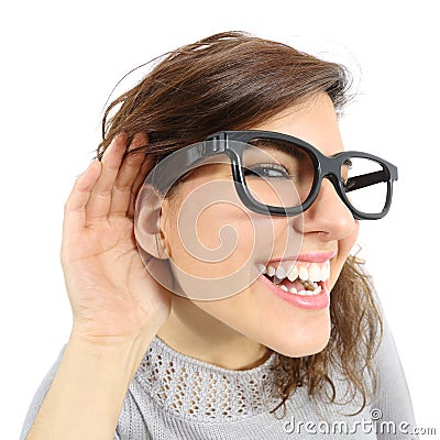 Close up of a woman listening with her hand in the ear Stock Photo