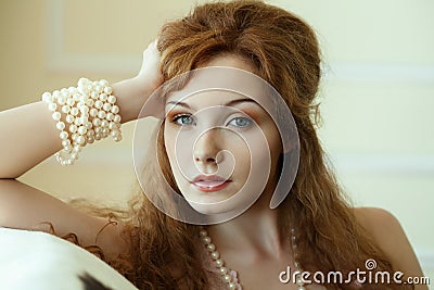 Close-up woman with pearls. Stock Photo